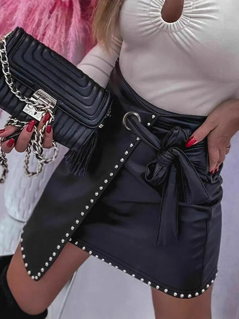 Edgy Chic Faux Leather Wrap Skirt with Belt and Stud Details