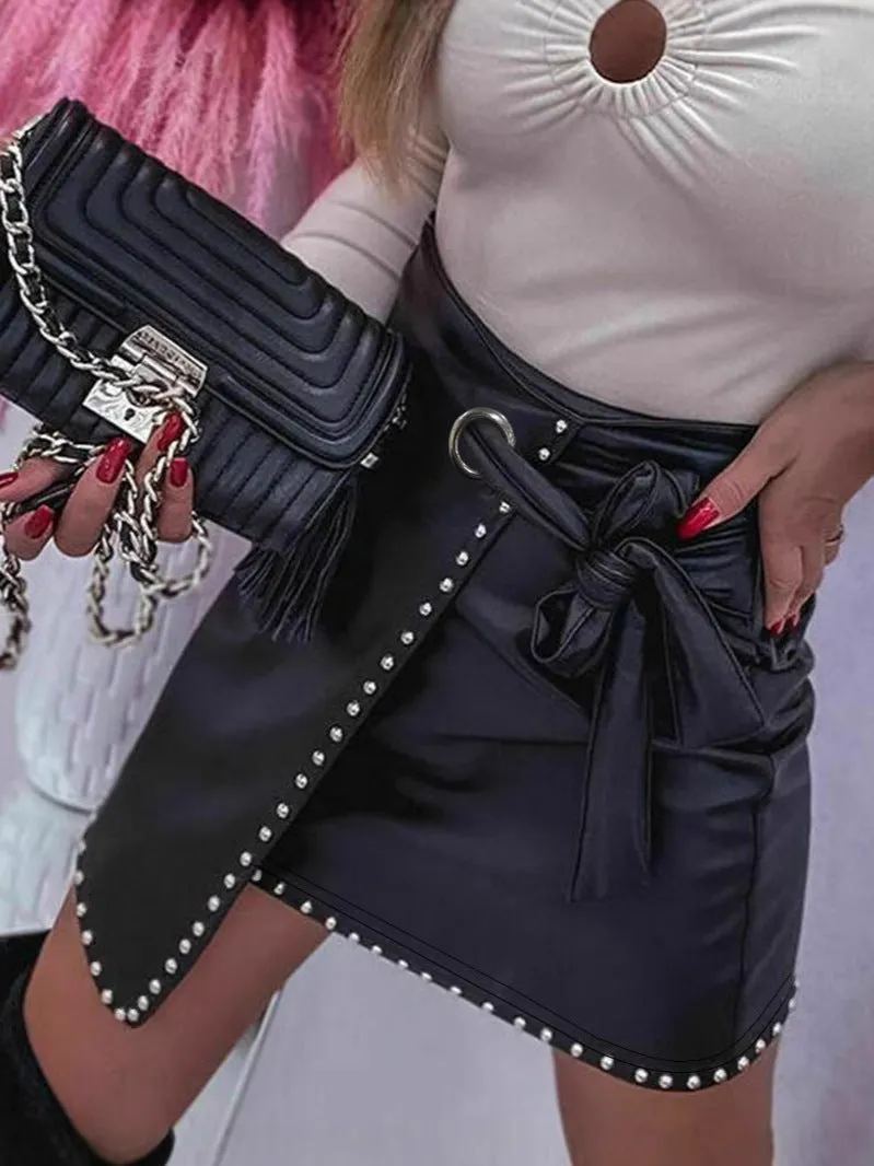 Edgy Chic Faux Leather Wrap Skirt with Belt and Stud Details
