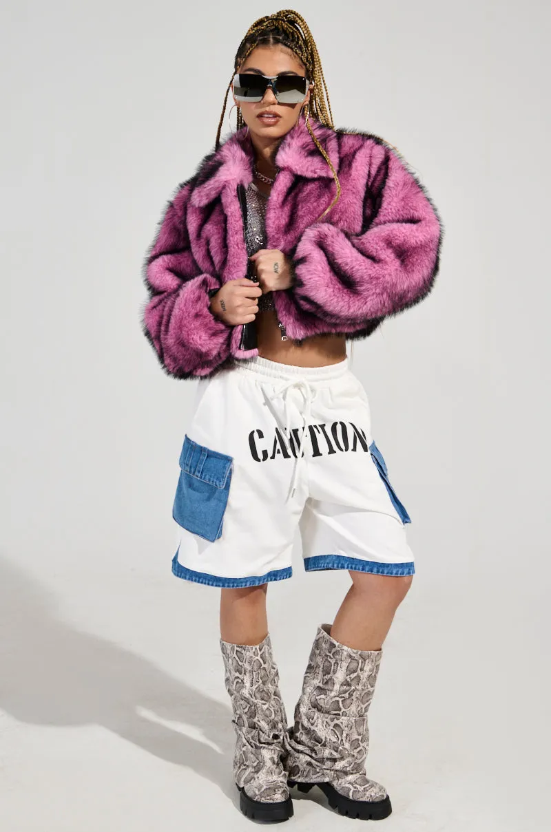 NOW YOU SEE ME FAUX FUR BOMBER IN PINK