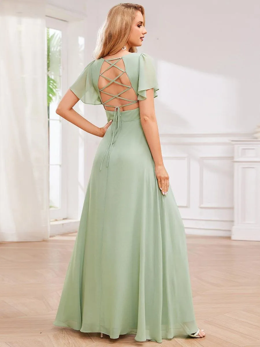 Robe de demoiselle d'honneur plissée trapèze en mousseline de soie avec liens croisés dans le dos et col en V