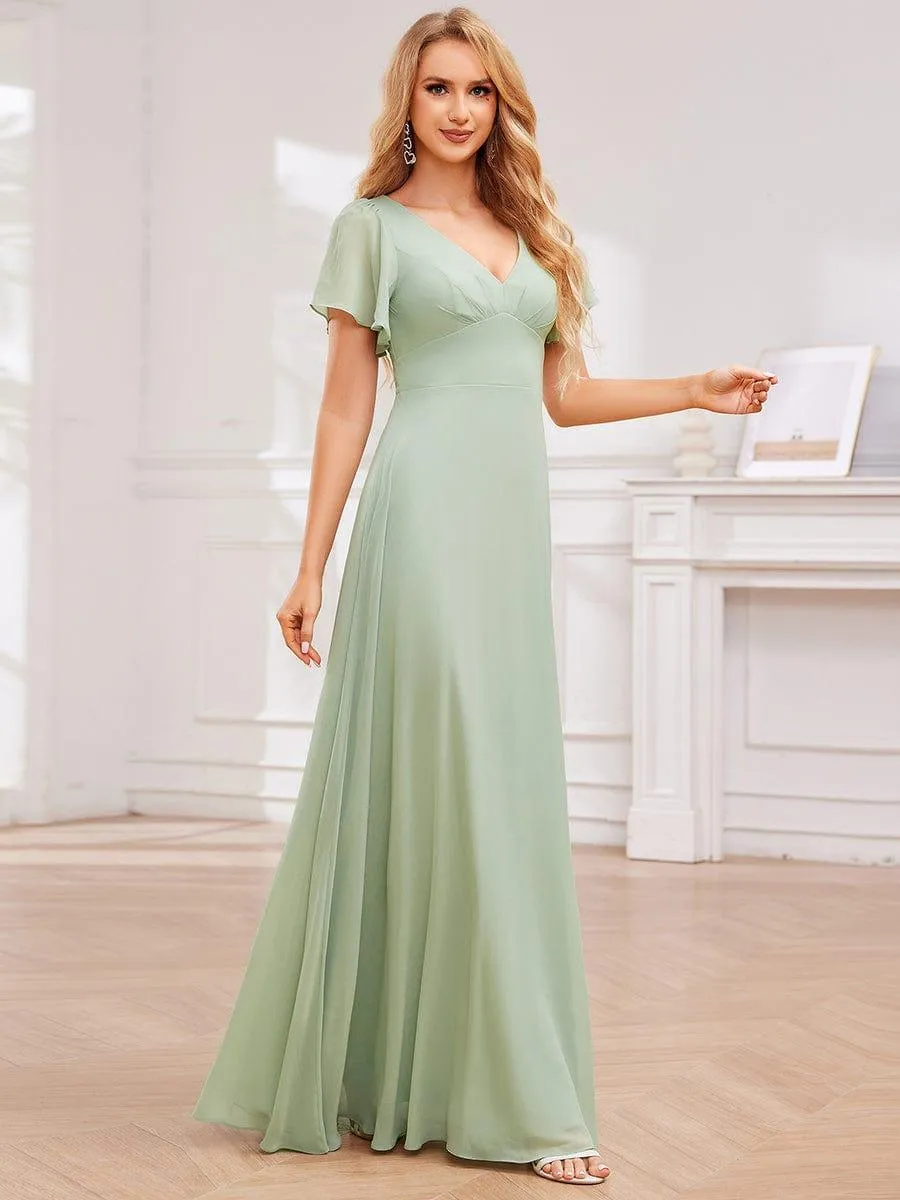 Robe de demoiselle d'honneur plissée trapèze en mousseline de soie avec liens croisés dans le dos et col en V