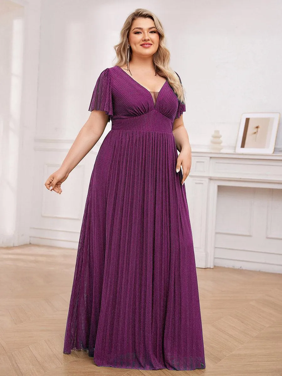 Robe de soirée transparente scintillante col en V taille empire manches courtes