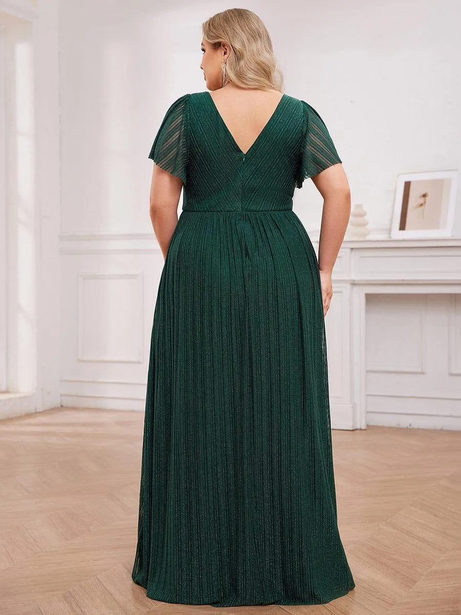 Robe de soirée transparente scintillante col en V taille empire manches courtes