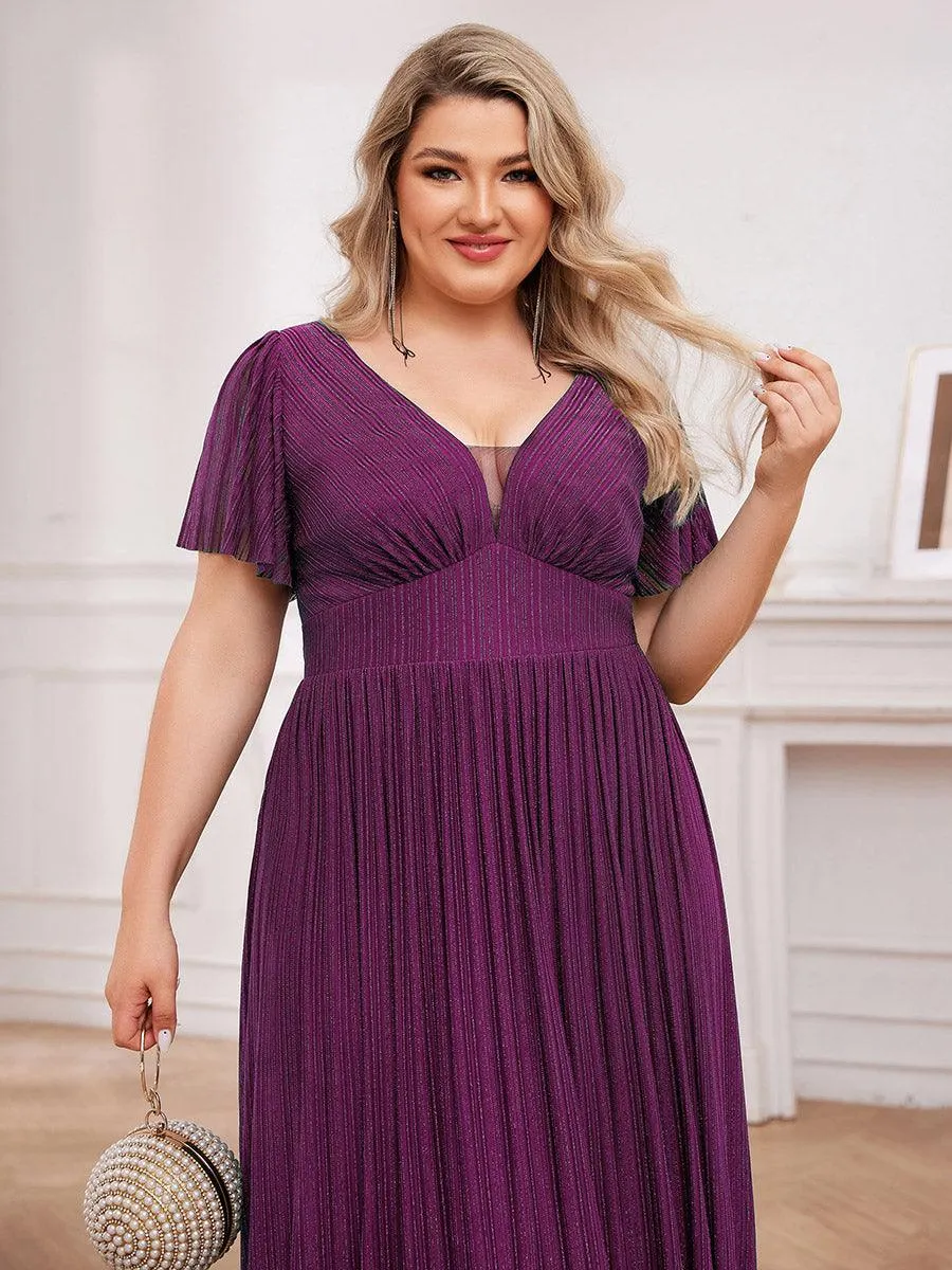 Robe de soirée transparente scintillante col en V taille empire manches courtes