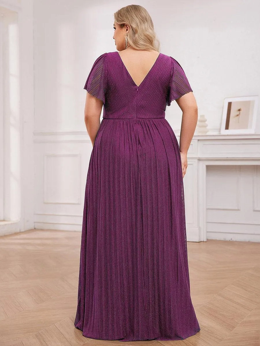 Robe de soirée transparente scintillante col en V taille empire manches courtes